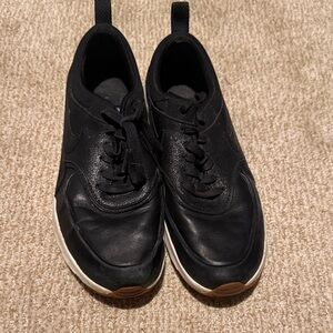 Nike Women's Black Athletic Sneakers with White Midsole